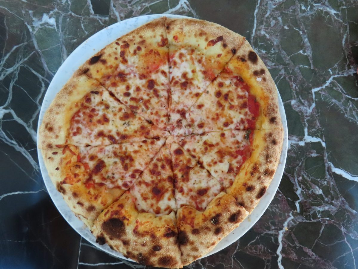 Wood-fired pizza served at Kannel Pizzeria, Four Seasons Mahe